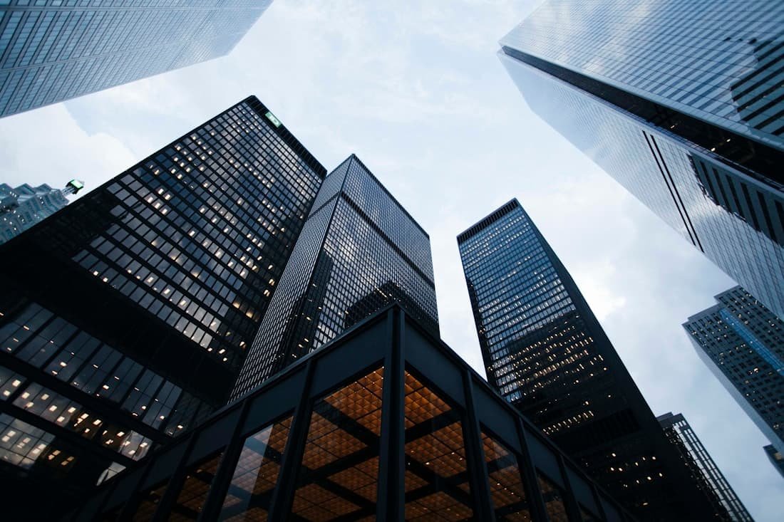 High-rise commercial towers seen from street level
